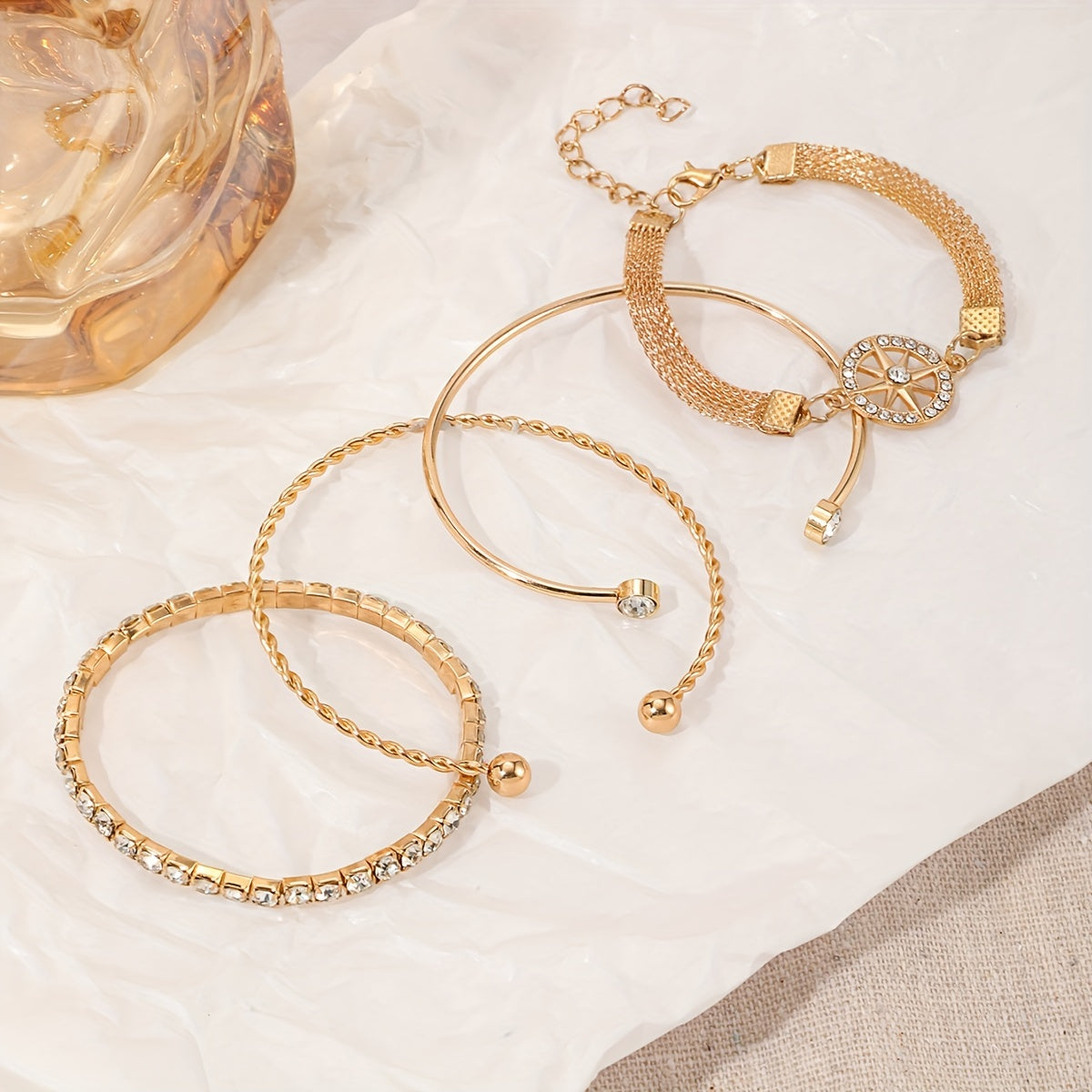 Elegant Gold-Plated Bracelet Set with Starburst Design and Crystal Accents