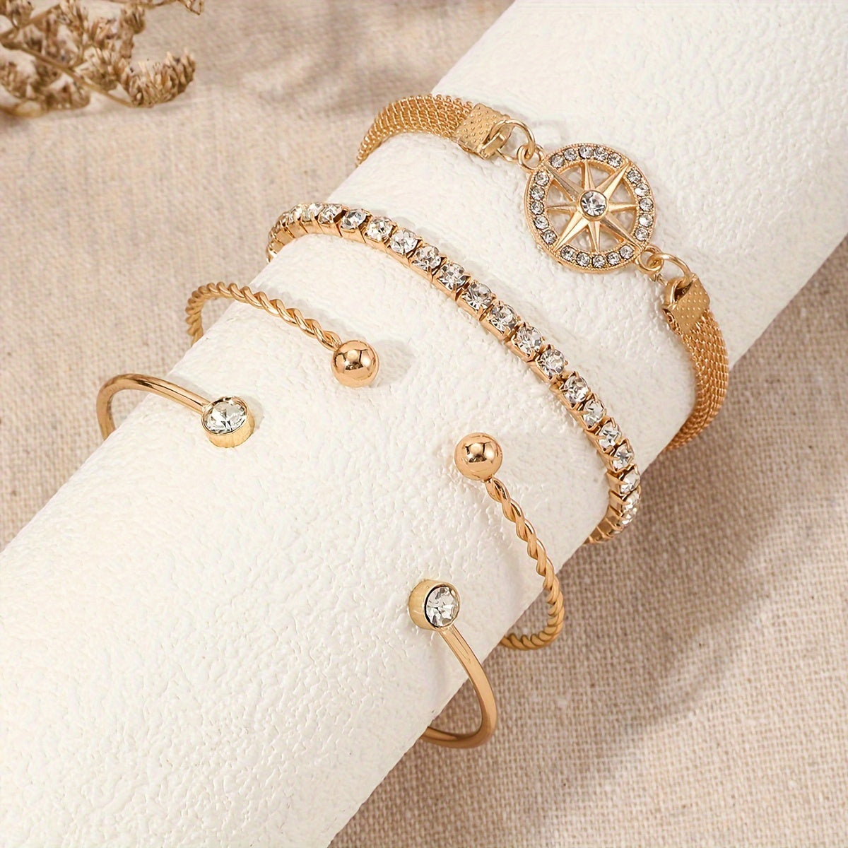 Elegant Gold-Plated Bracelet Set with Starburst Design and Crystal Accents