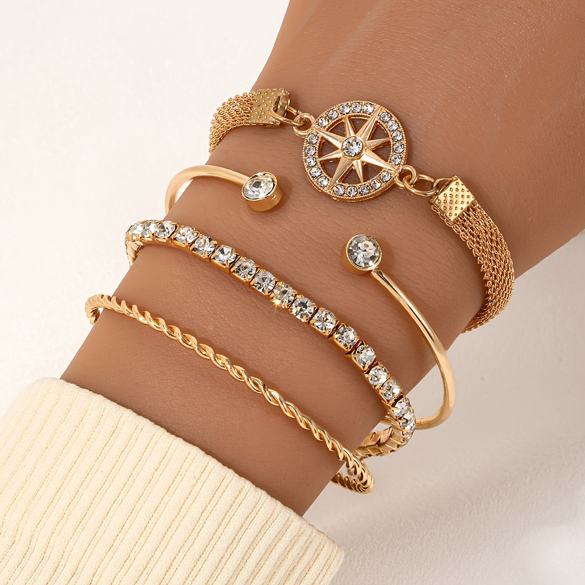 Elegant Gold-Plated Bracelet Set with Starburst Design and Crystal Accents